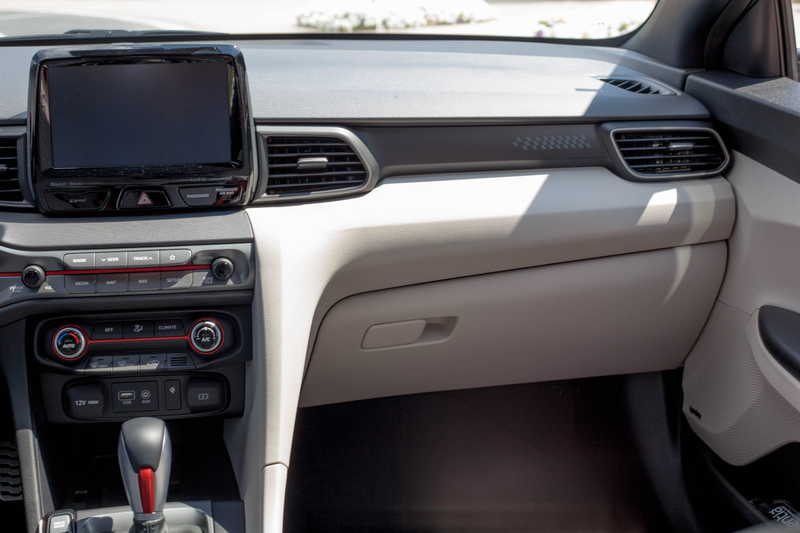 This is the nice two-tone interior of the Turbo Ultimate, but everything south of the air vents is hard plastic on all models.